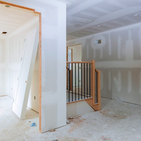 walls plasterboards with room under construction with finishing putty in the room